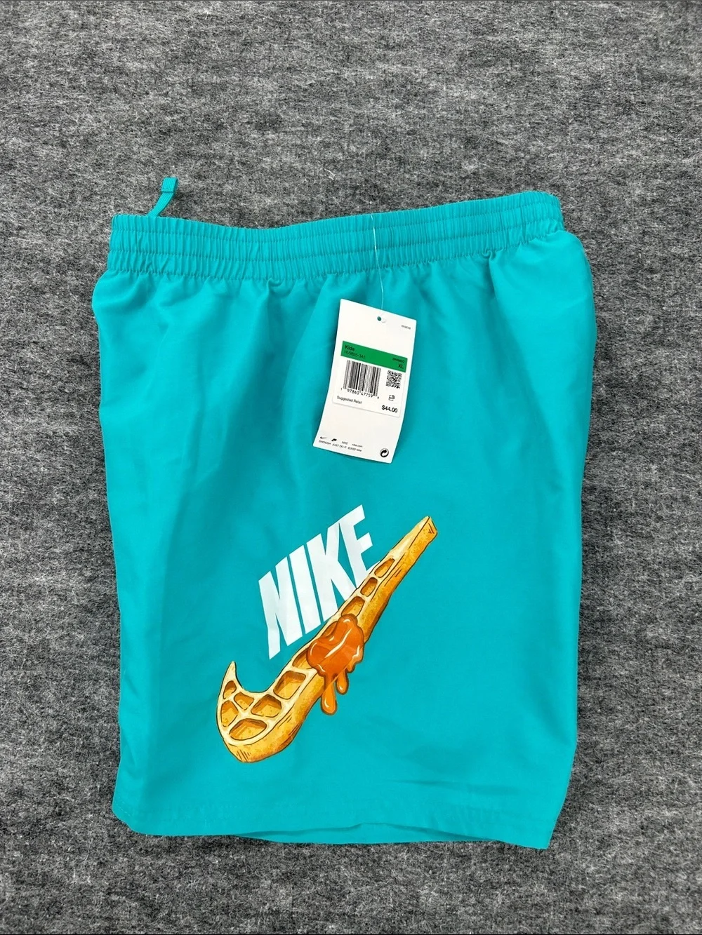 Nike Kids Turquoise Swim Shorts with White Logo and Gold Swoosh Size XL